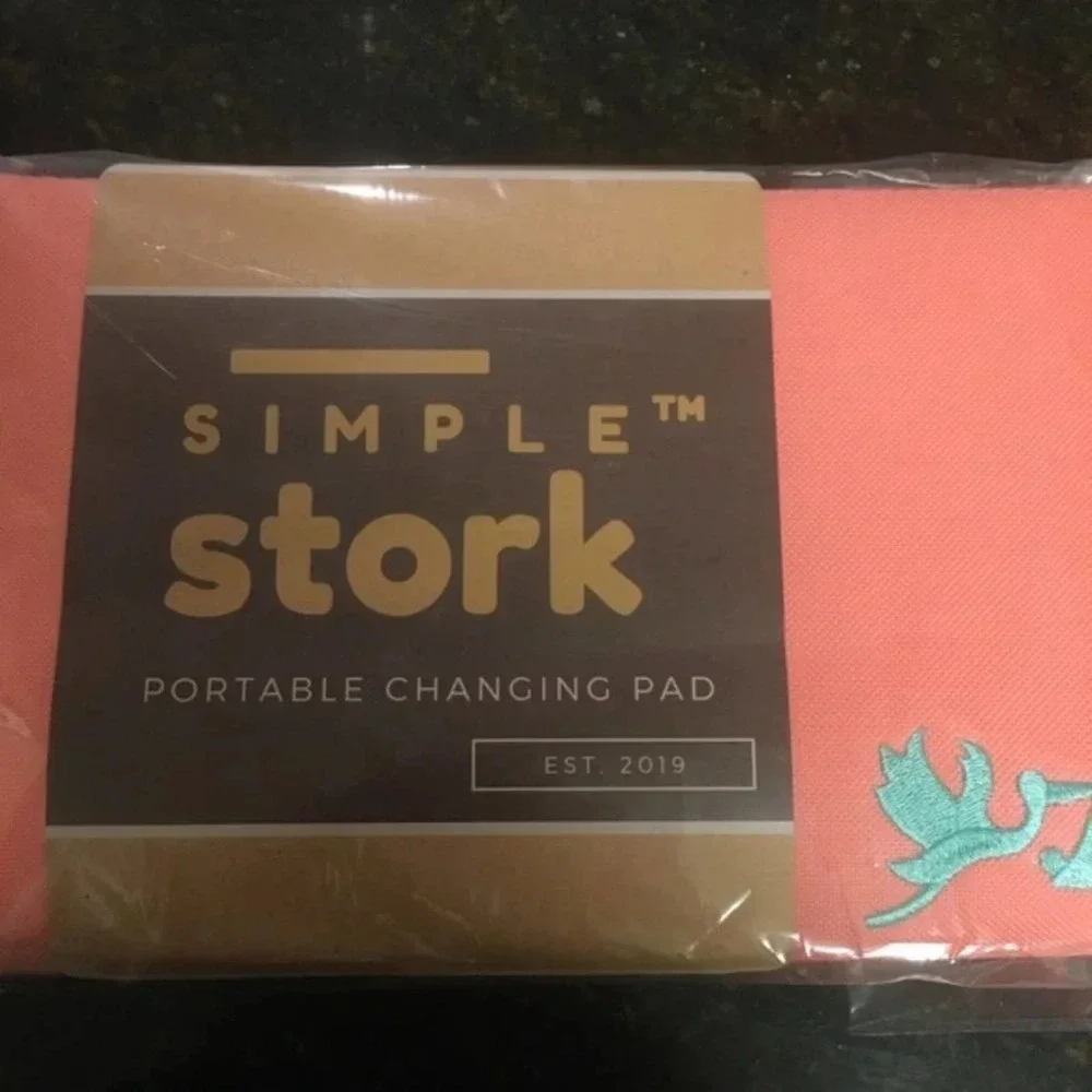 BRAND NEW portable changing pad! Amazing Size!